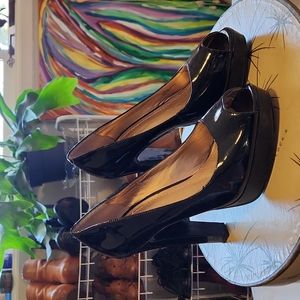 BCBGeneration Black Patent peeptoe Platform Pumps